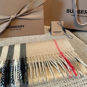 Authentic Burberry scarf w/all original packaging, including gift receipt. $350